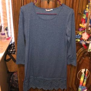 A blue long sleeve dress